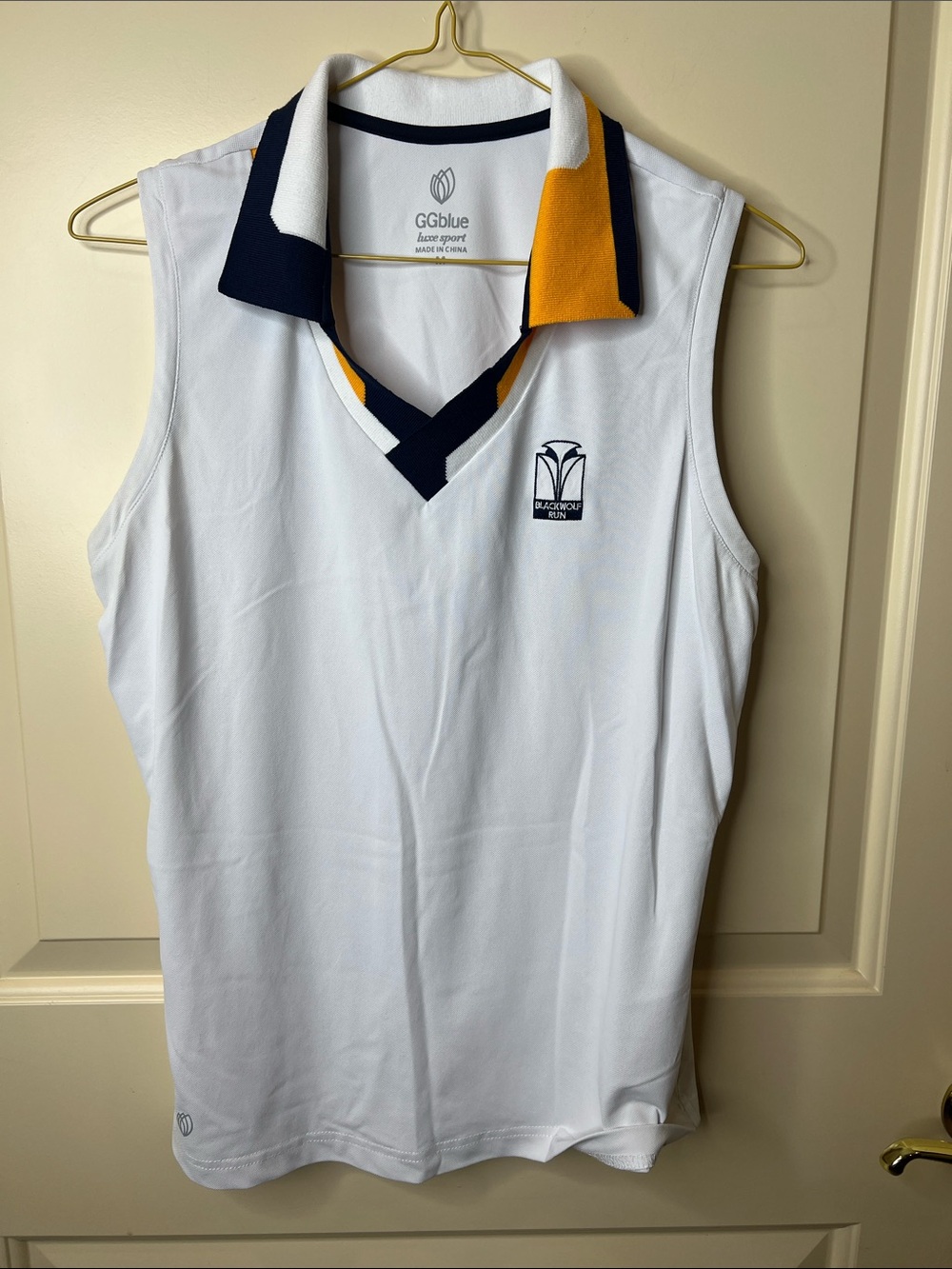 GGblue White Sleeveless Tennis Golf Polo with Navy & Gold Trim Black Wolf Run